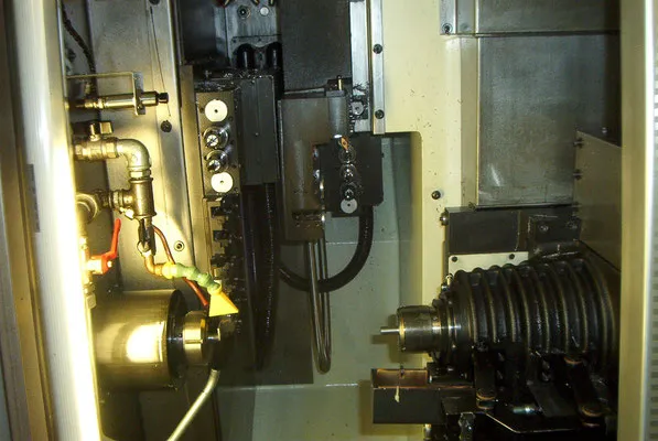 View into the work area of a machine tool with clamping fixture